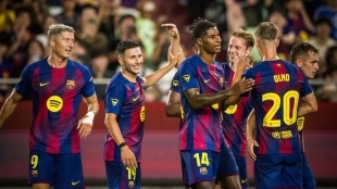 The Barcelona players celebrate a goal